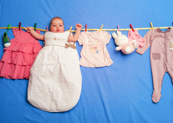 Baby hanging up with laundry
