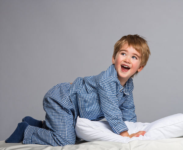 Boy wearing blue pyjamas