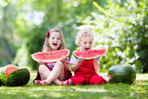 children eating watermelon