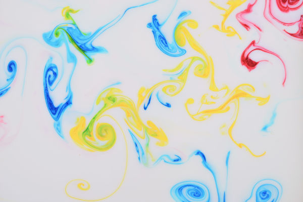 ink background with colorful ink and milk