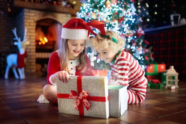 Children opening christmas eve box