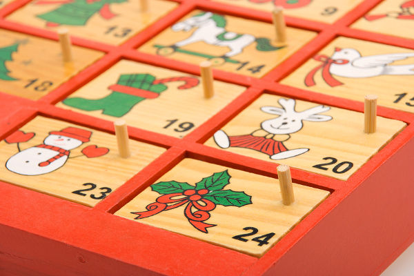 close-up view of a hand painted wooden advent calendar