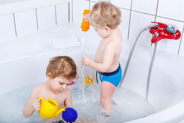 two-children-playing-in-bath