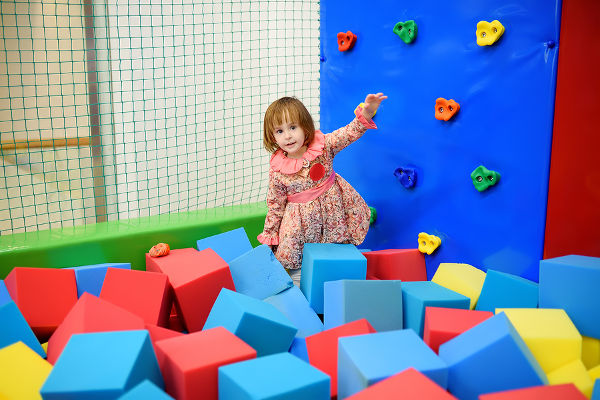 Girl in soft play