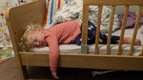 Child asleep in bed