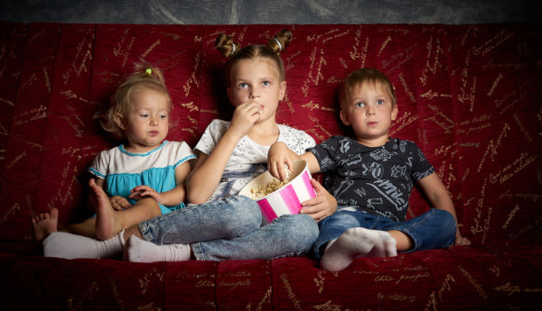 children watching a movie