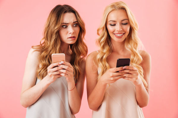 women using phones