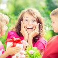 Children giving mum flowers