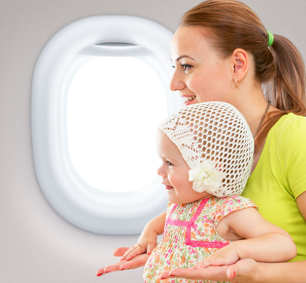 Woman and baby in plane