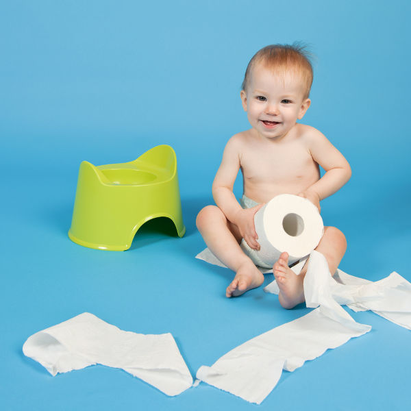Baby unraveling toilet paper
