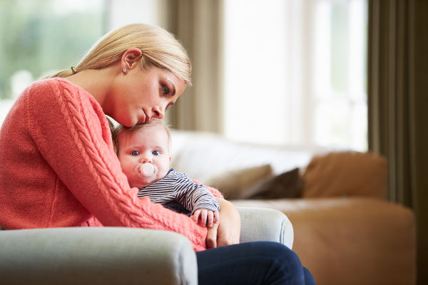 mother holding baby