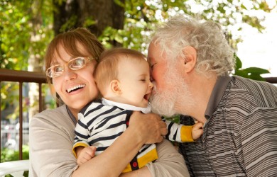 Grandparents having great fun with their grandchild