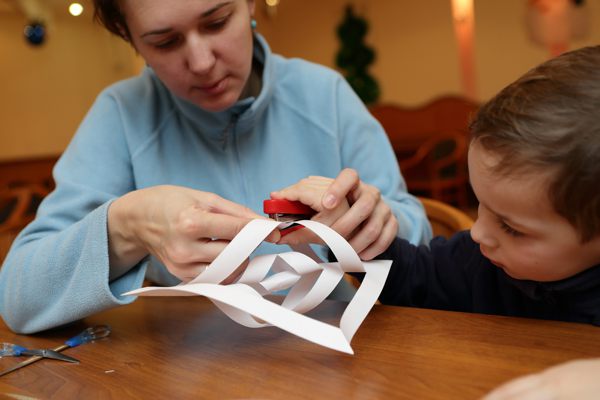 mother & son making decorations