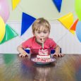 kid with birthday cake feature