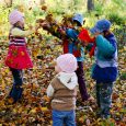 An image of children playing in the autumn park