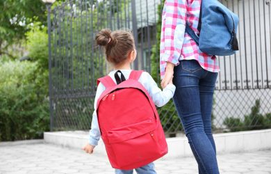 Parent taking child to school