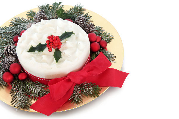 Traditional christmas cake with red bauble decorations