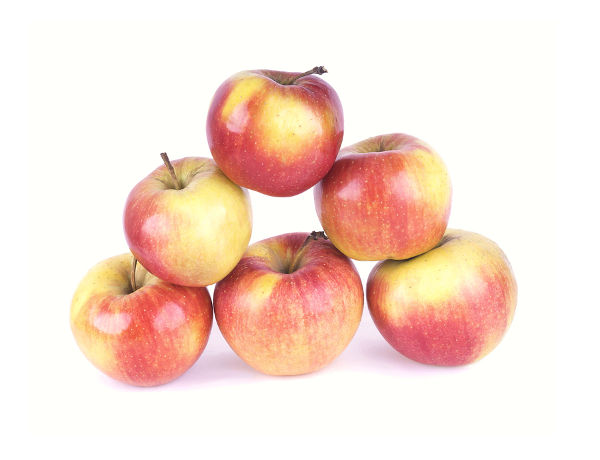Pyramid of six apples. Triangular Pyramid of red apples.