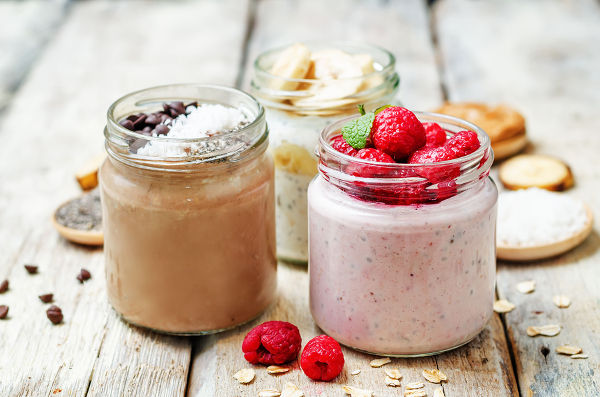 set overnight oats with berries coconut peanut butter Chia seeds and chocolate chips