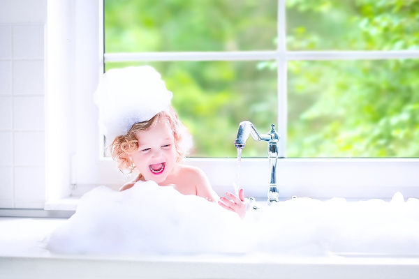 girl having bubble bath
