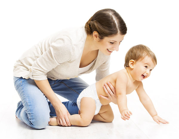 Mother and crawling toddler