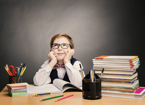 Boy in glasses ready for school