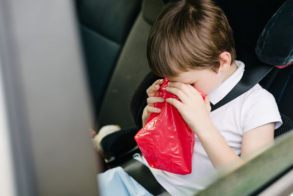 Seven years old child vomiting in car - suffers from motion sickness