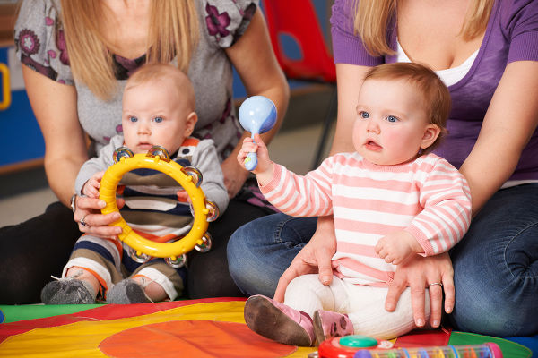 Mothers And Babies Having Fun At At Music Group