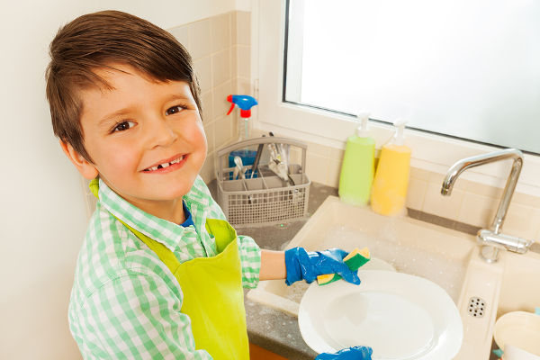 boy-cleaning-plates