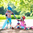 fearure child-helping-friend-fallen-off-skateboard