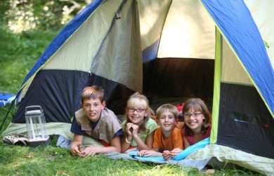 Kids camping in a tent