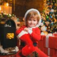 Child holding Christmas Stocking
