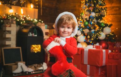 Child holding Christmas Stocking