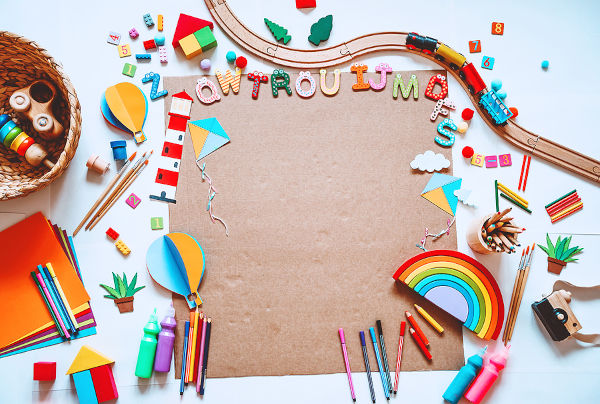 Colourful craft supplies and toys on a table